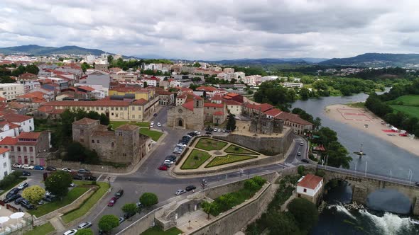 Fly Above River and City of Barcelos, Portugal alt