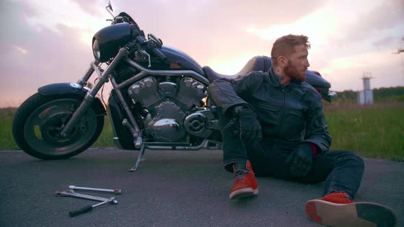 The Biker's Motorcycle Broke Down He Sits and Waits for Help