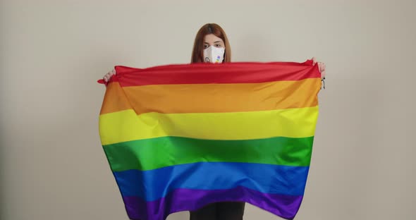 Girl Waves the Peace Flag to End the War in Ukraine alt
