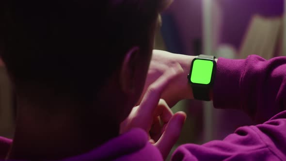 Man Using Smartwatch with Chroma Key Closeup alt