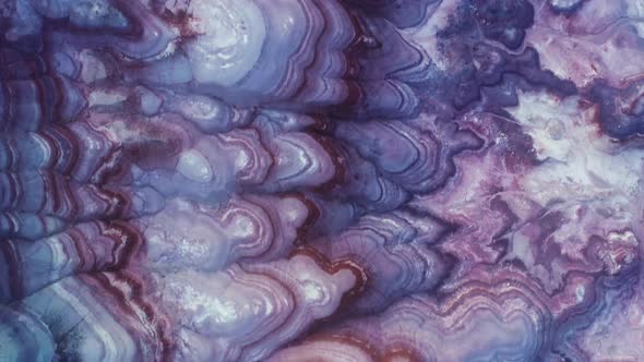 Abstract Deep Purple and Blue Wavy Lines on Sandstone Texture Mountain Canyon alt