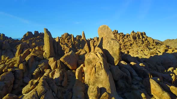 Scenic aerial drone view of a rocky desert landscape. alt