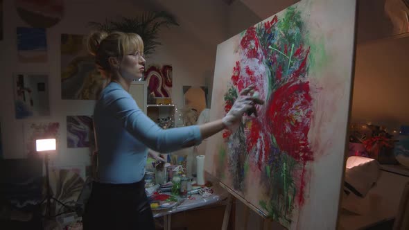 Talented Female Artist Working on a Modern Abstract Oil Painting Uses Splattering and Dripping with