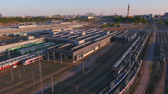 Amazing Aerial Shot of a Train Driving Through a Railway Station in Helsinki