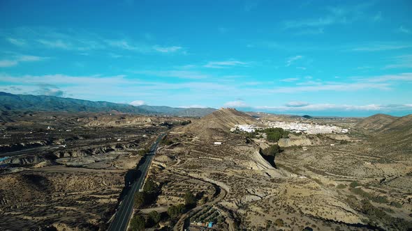 Aerial View Of A Road By The Desert alt