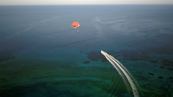 Parasailing in the Open Sea