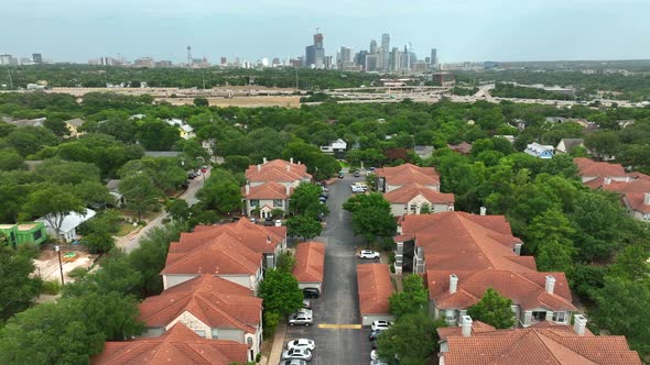 Southwest USA view. Homes in residential distance. Urban American city skyline in distance. Rising a alt