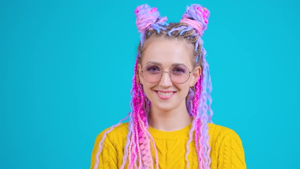 Emotional Portrait of Stylish Young Woman Smiling in Camera