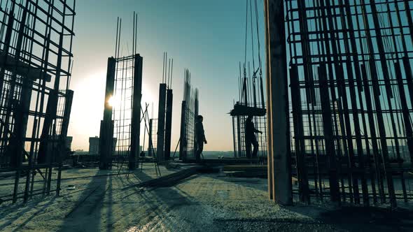 Technicians Are Working with Metal Carcasses at the Rooftops alt
