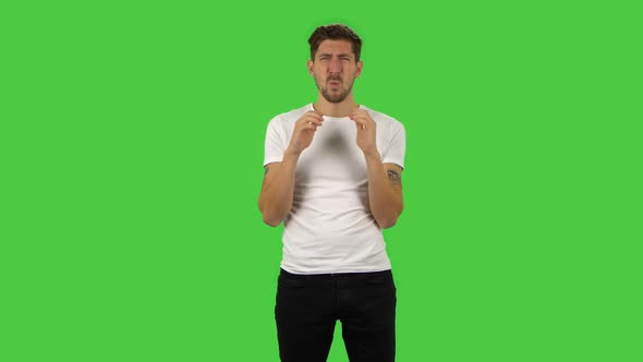 Confident Frustrated Guy Is Saying Wow with Shocked Facial Expression. Green Screen alt