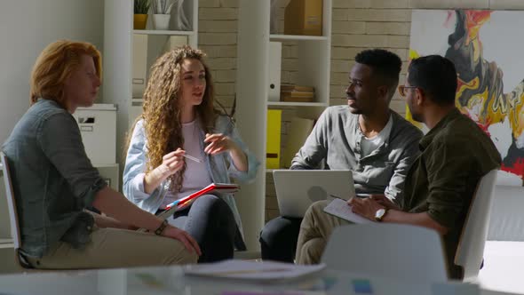 Team of Creative Professionals Celebrating Achievements alt