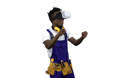 Engineer African American with Virtual Reality Glasses Looks at the Building . Alpha Channel alt