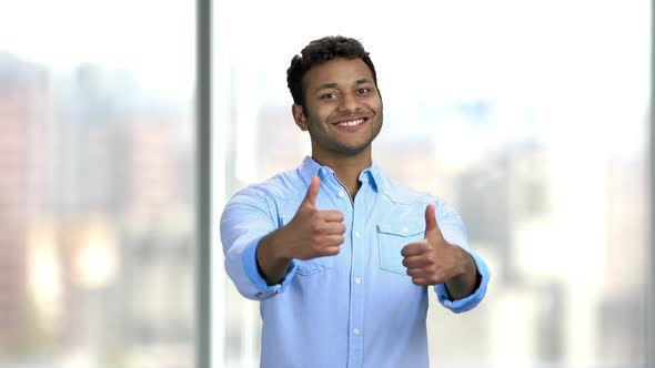 Handsome Businessman Giving Two Thumbs Up alt