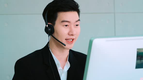 Business People Wearing Headset Working in Office alt