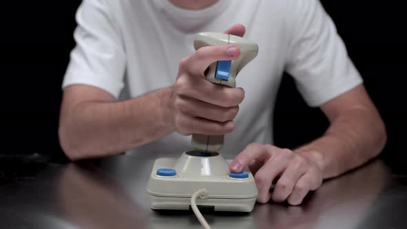 Young Man Playing Video Game alt