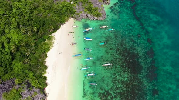 Boats and Tourists on the Beach alt