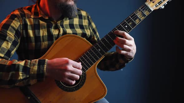 Man Play Acoustic Guitar At Blue Wall Stock Footage Videohive 3947