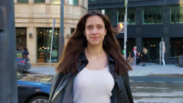 Confident Businesswoman Walking Street Smiling alt