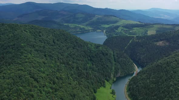 Aerial view of the Palcmanska masa water reservoir in the village of Dedinky in Slovakia alt