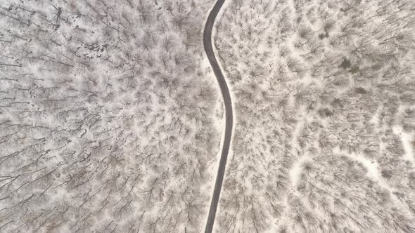 Above the mountain road by February 4K aerial video alt