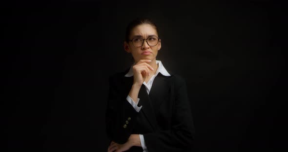 Emotional Asian Woman in Business Clothes Was Thinking About Something