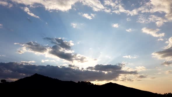 Sunset Motionlapse with mountains and clouds alt