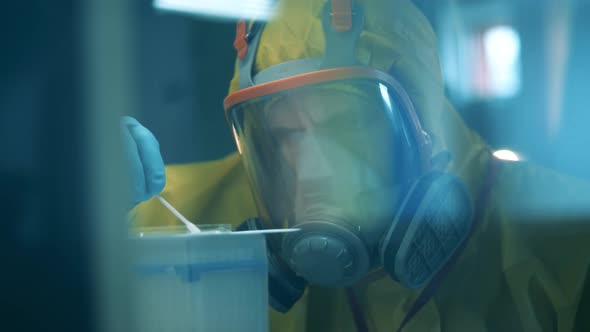 Close Up of a Science Expert Is Working with 2019-Ncov Probes alt