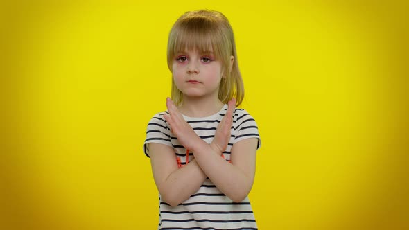 Little Child Kid Girl Say No Hold Palm Folded Crossed Hands in Stop Gesture Warning of Finish alt