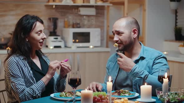 Happy Couple with Pregnancy News alt