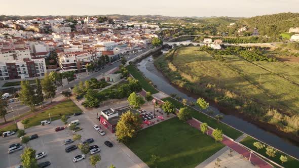Outdoor carpark, at Silves swimming pool complex, by the Arade River. alt