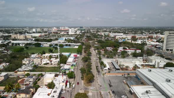Aerial view of avenue in Merida Yucatan with railroad in the middle alt
