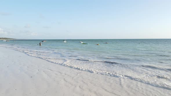 Boats in the Ocean Near the Coast of Zanzibar Tanzania Slow Motion alt
