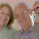 Excited Senior Couple Showing Bunch of Keys From New Apartment - VideoHive Item for Sale