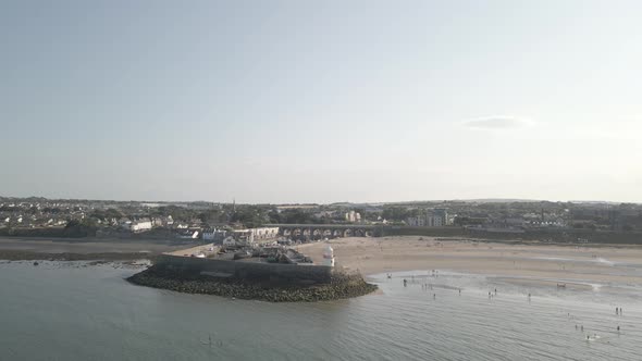 Aerial View Of Beach And Small Port In Balbriggan, Republic of Ireland - drone shot alt