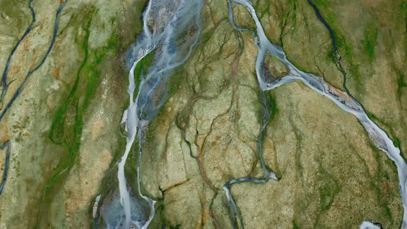 Aerial Top View of Nordic Landscape Flyover Green Valley Beautiful Formations Flight Over Winding alt