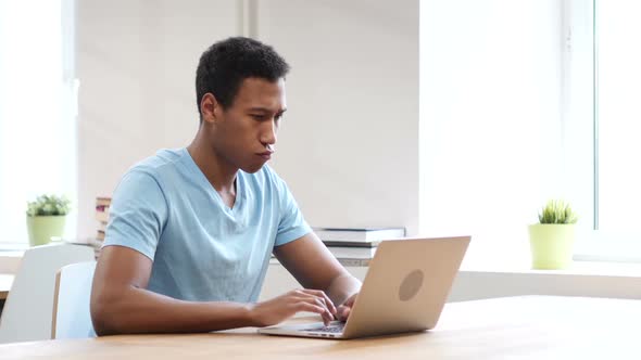 Thumbs Down by Black Man at Work, Both Hands alt