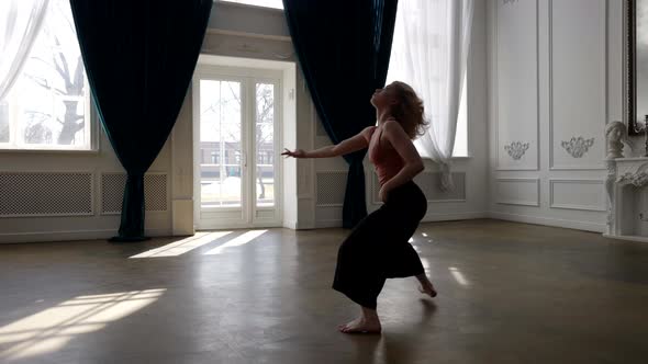 Graceful Female Ballet Dancer is Moving in Rehearsal Hall Modern Choreography alt