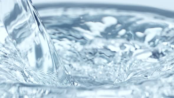 Super Slow Motion Shot of Pouring and Splashing Water at 1000 Fps alt