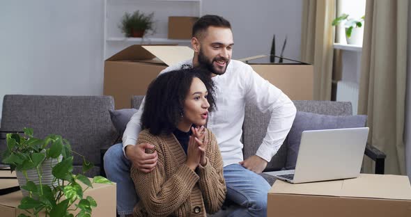 Happy Multiethnic Couple Caucasian Man and African Woman Making Online Video Call Conference with alt