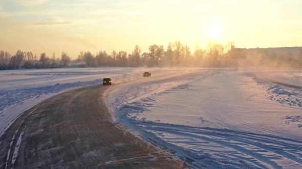 Racing Cars Compete on the Ice Track at Sunset