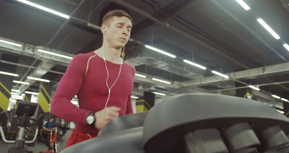 Sportsman Running an the Gym