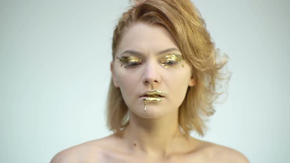 Girl with Golden Makeup alt