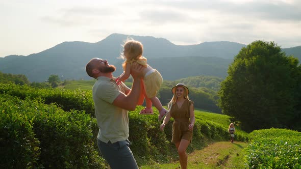 Family with Kids Enjoying Time Together Outdoor alt
