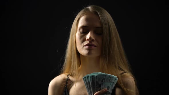 Young Woman Stroking Body With Dollars, Enjoying Budget, Casino Jackpot, Victory alt
