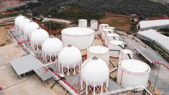 Huge spherical gas tanks in industrial complex. Fuel factory tanks with storage. alt