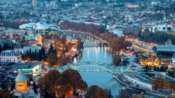 Tbilisi, Georgia. Top View Of Famous Landmarks In Night Illuminations. Georgian Capital Skyline alt