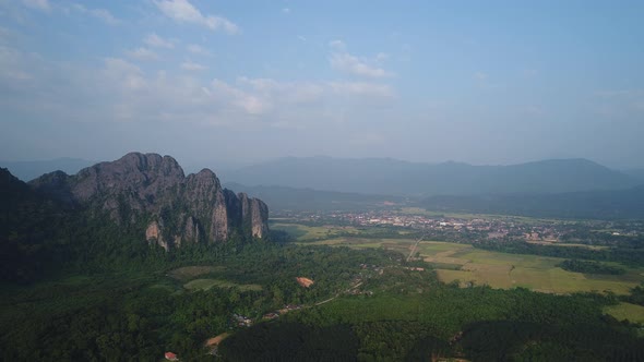Nature landscape near town of Vang Vieng in Laos seen from the sky alt