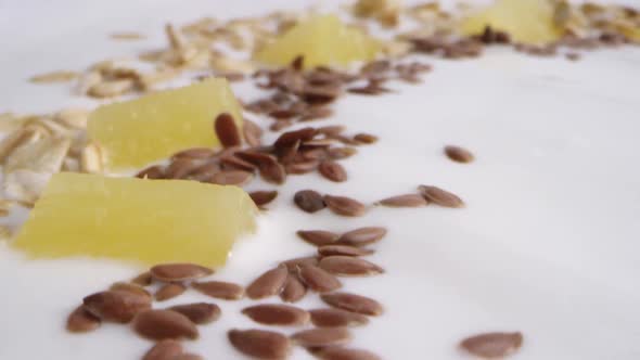 A Delicious Dessert of White Yogurt with Pineapples, Nuts and Seeds alt