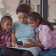 Cheerful Mom and Kids Networking on Cellphone - VideoHive Item for Sale