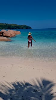 Anse Source d'Argent La Digue Seychelles Young Woman on a Tropical Beach During a Luxury Vacation in alt